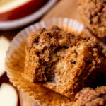 Bite missing from apple muffins.