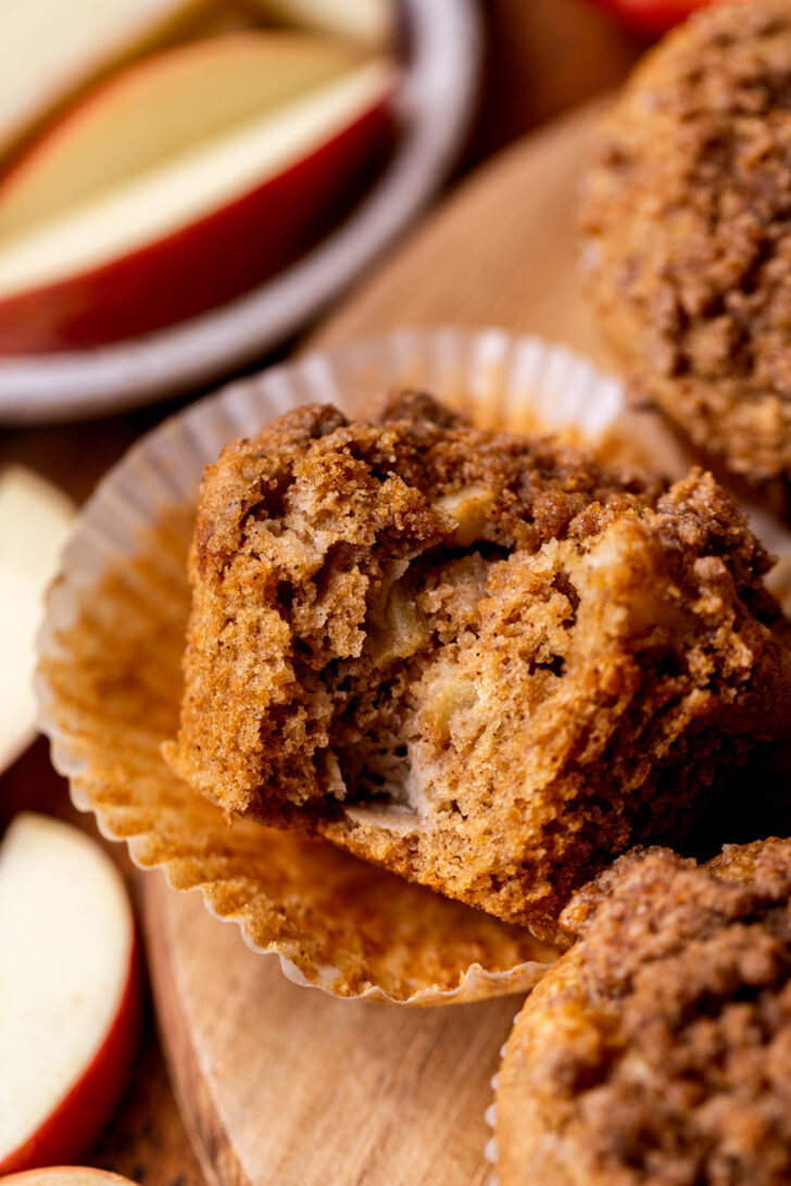 Bite missing from apple muffins.