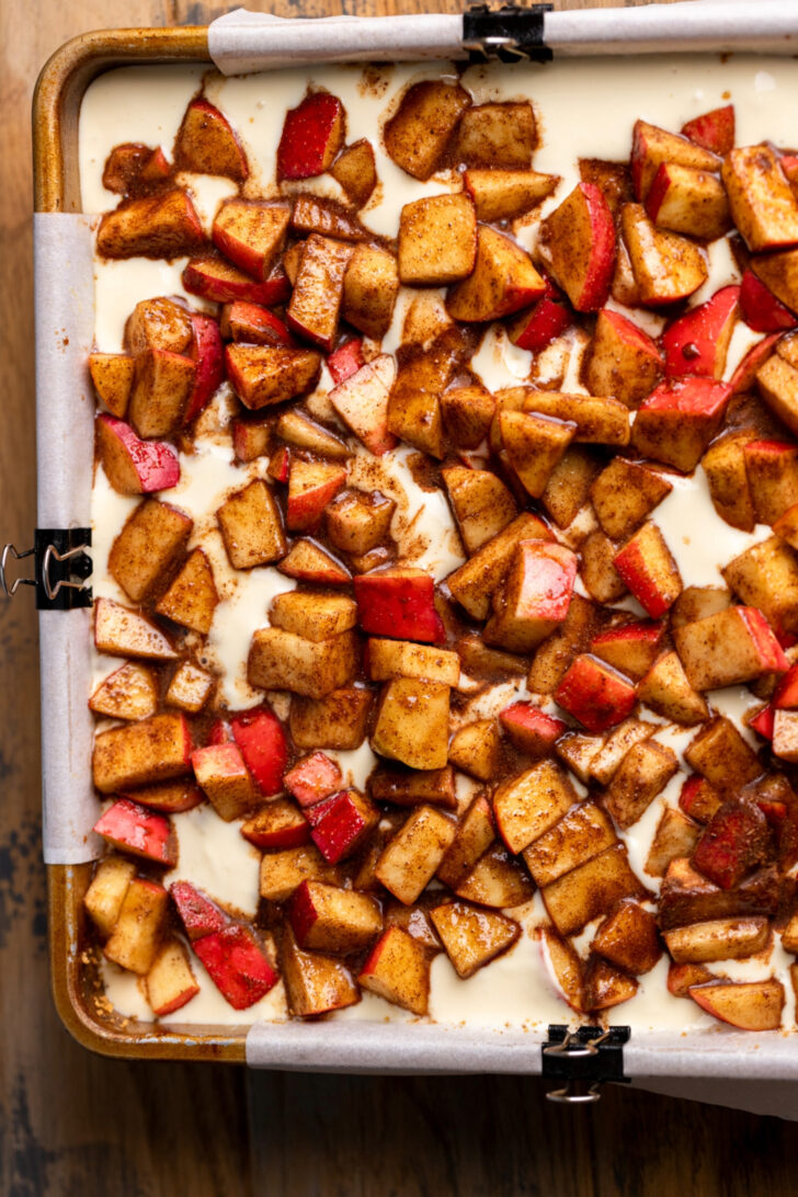 Apples on top of cheesecake batter.