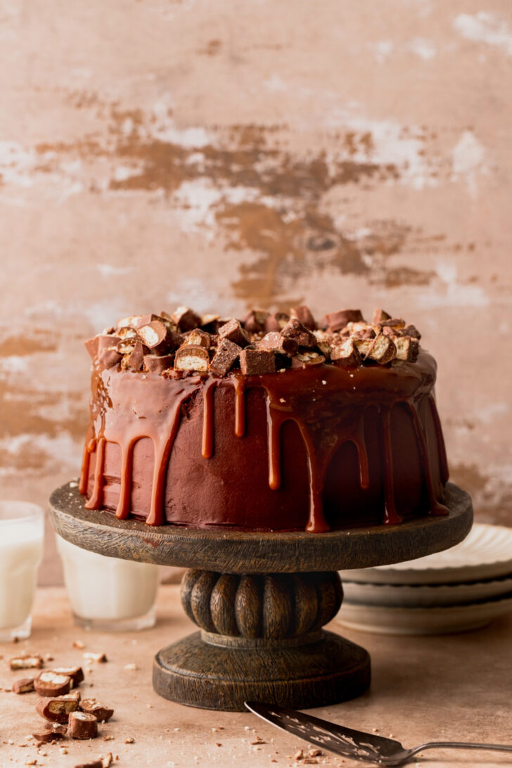 Decorated cake on a cake stand.