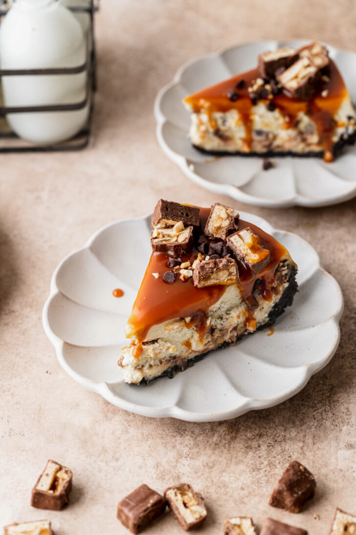 One slice of cheesecake on a plate top view.
