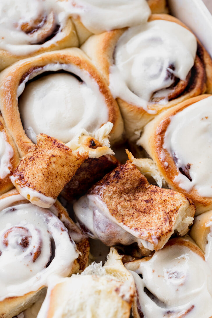 One cinnamon roll split open.