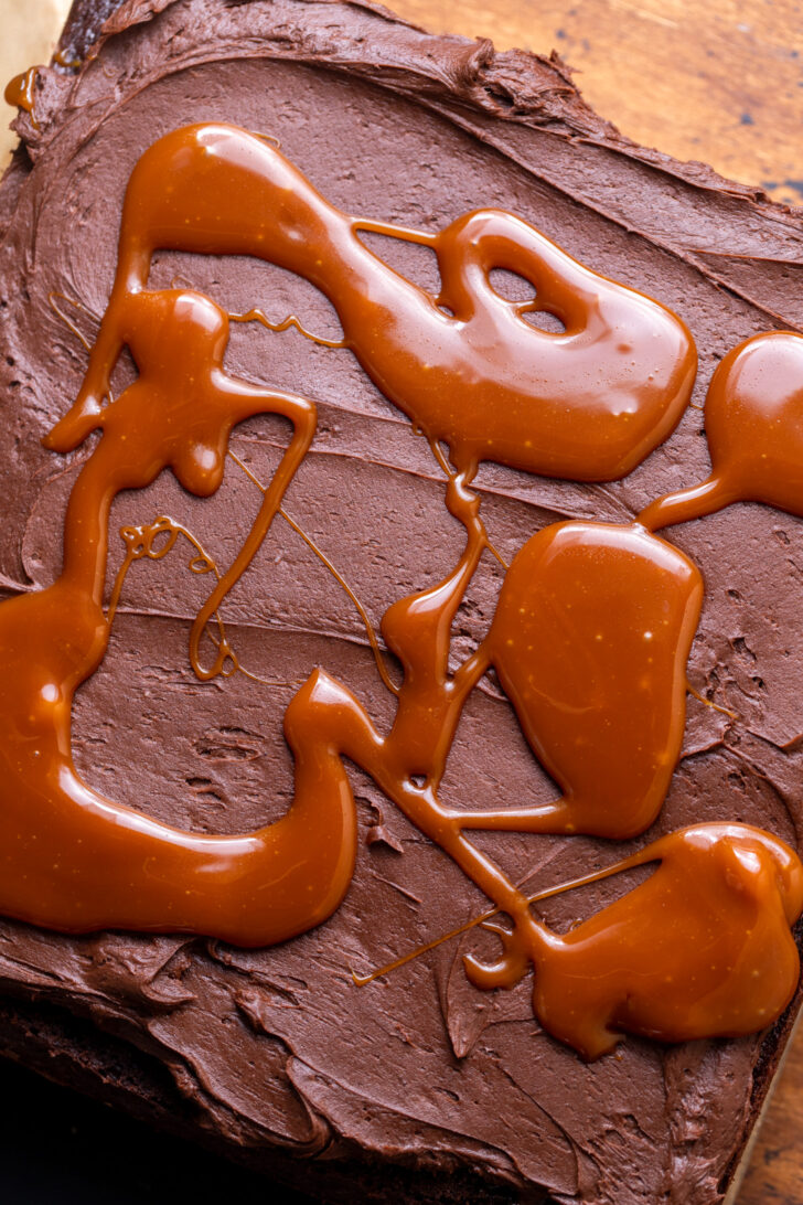 Caramel dollops on top of frosting.