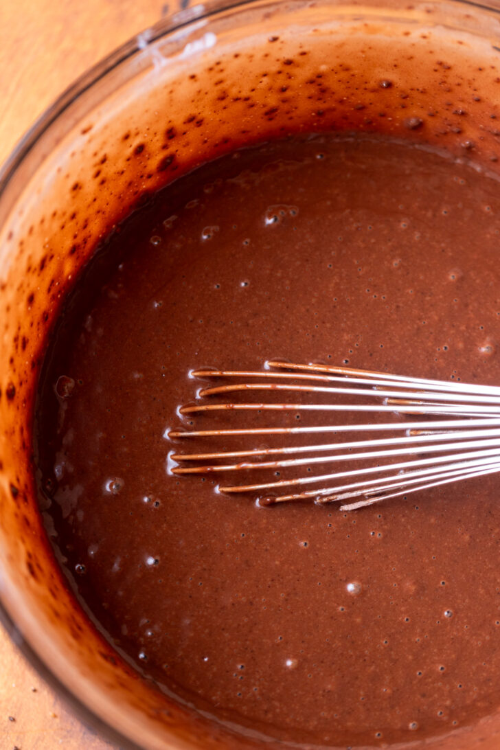 Chocolate cake batter in a bowl.