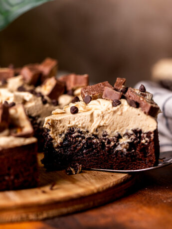 Taking a slice out of the snickers cake.