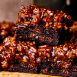 Stack of three pecan pie brownies.