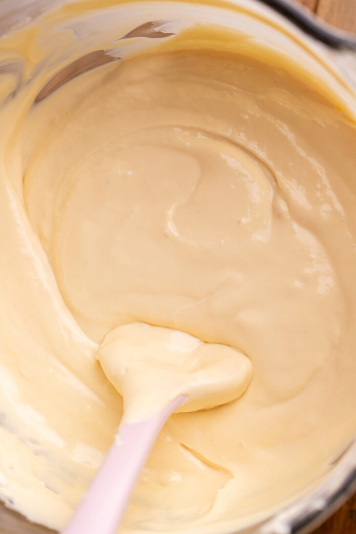 Caramel cheesecake batter in a bowl.