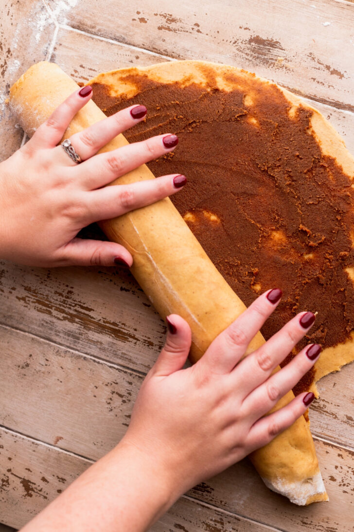 Rolling up the dough into a log.