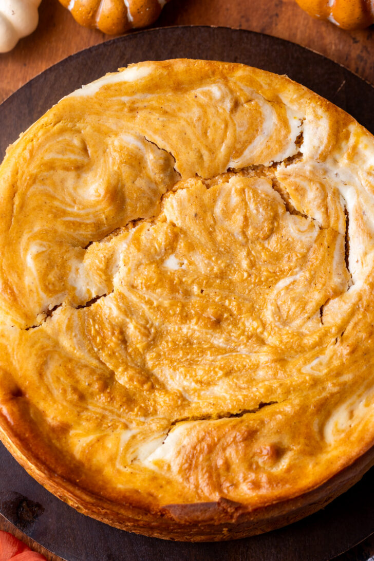 Baked cake on a wood board.