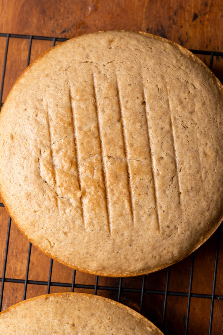Baked cake on a wire rack.