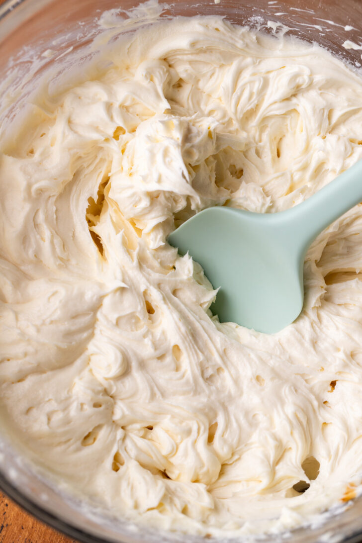 Cream cheese frosting in a bowl.
