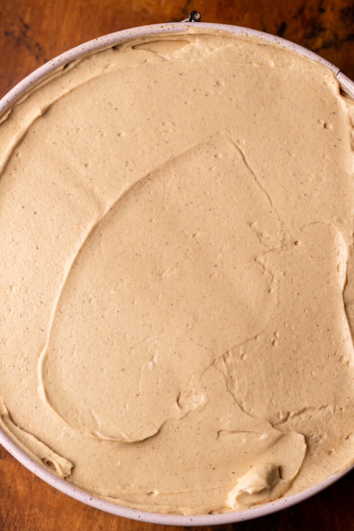 Cheesecake batter in a springform pan.