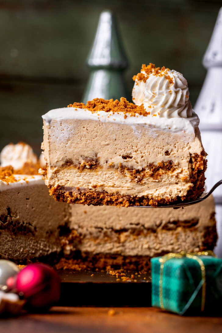 Taking a slice out of the cheesecake.