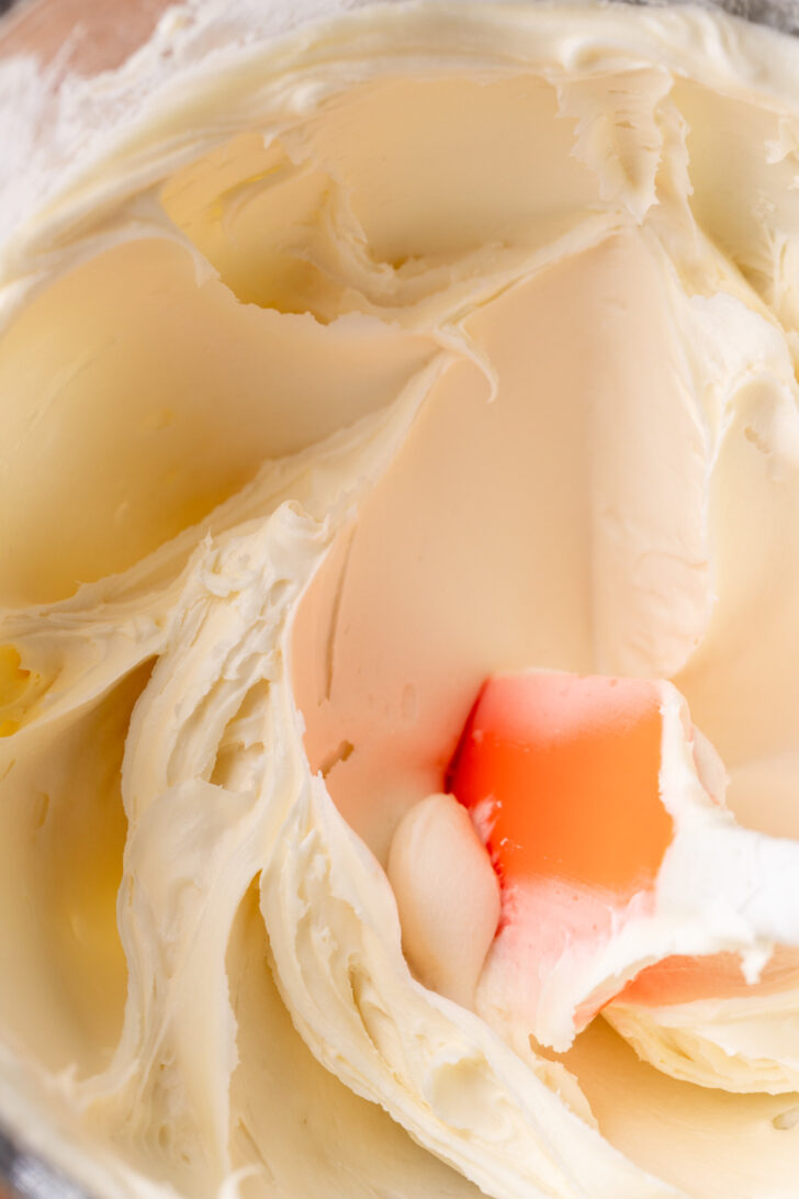 Cream cheese frosting in a bowl.