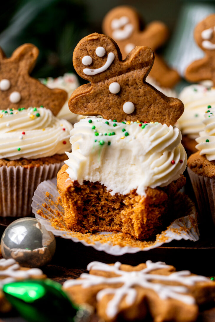Bite missing from gingerbread cupcakes.