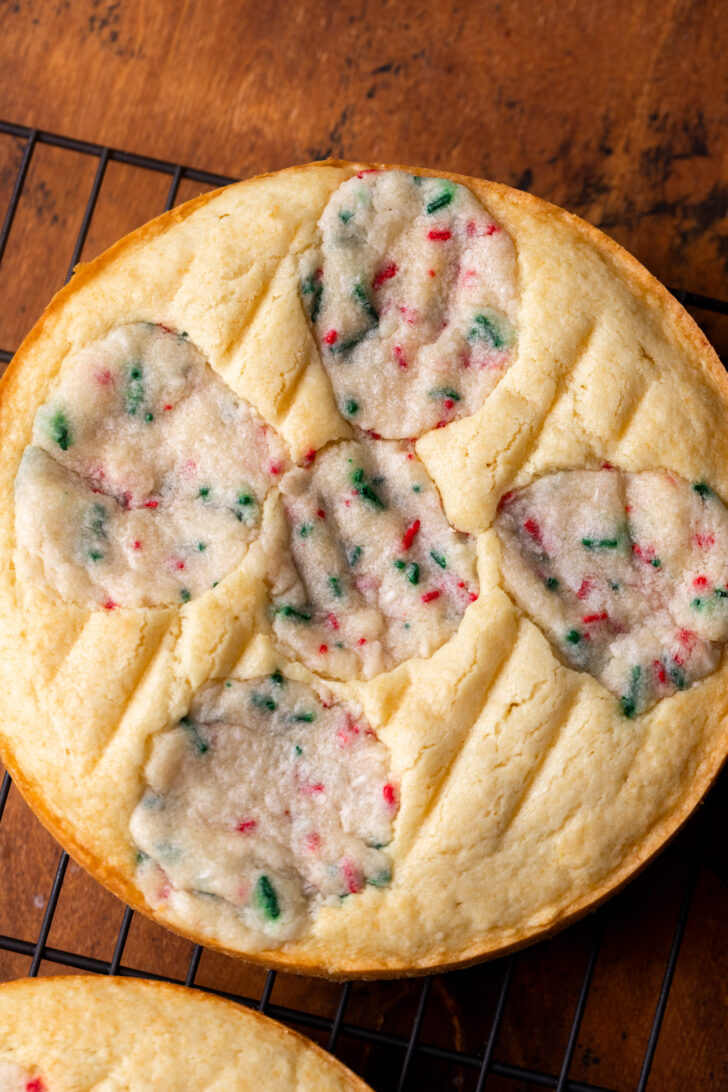 Baked cake on a wire rack.