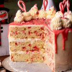 White chocolate peppermint cake opened up on a platter.