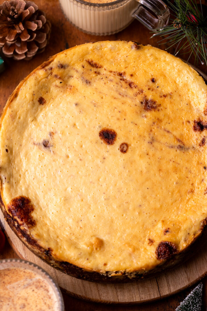 Baked cheesecake on a platter.