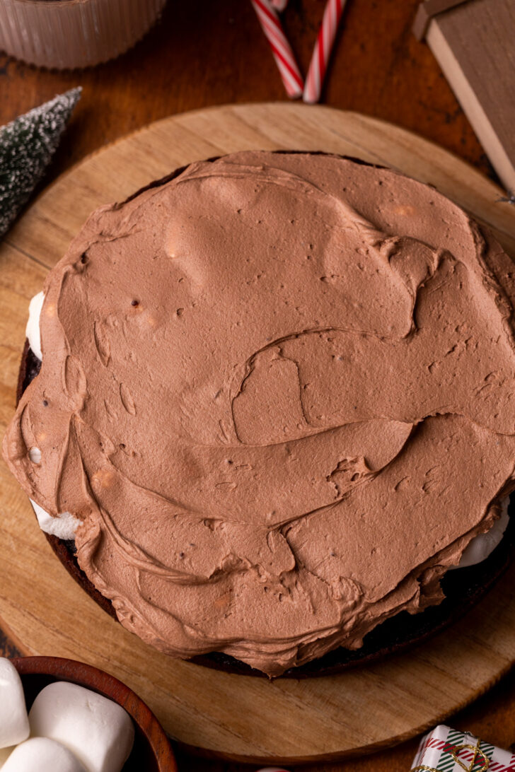 Hot chocolate frosting on top of cake layer.