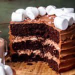 Split open hot cocoa cake on a wood board.
