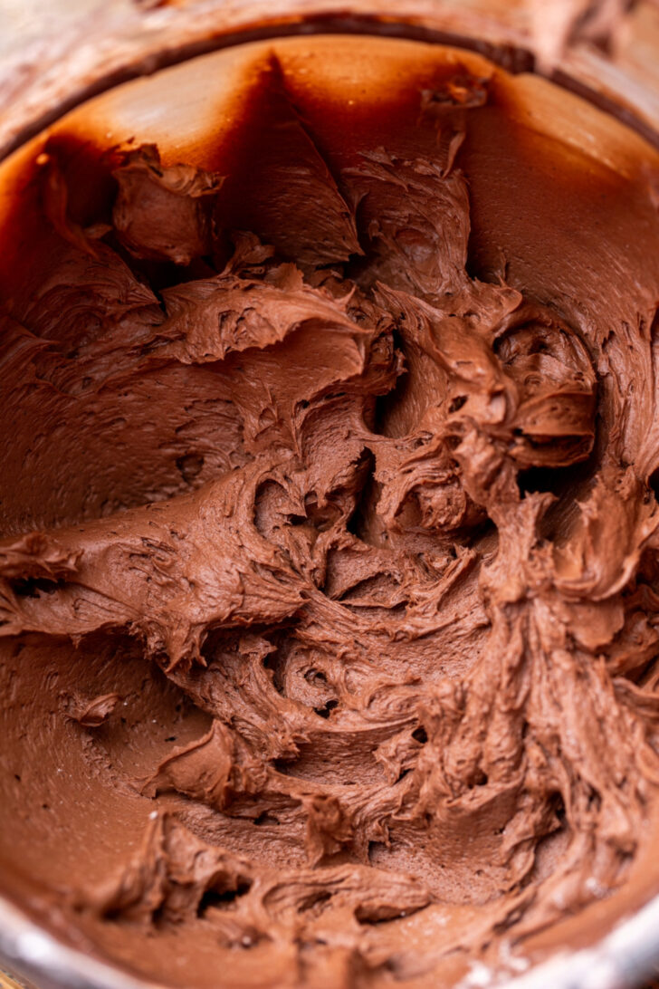 Chocolate frosting in a bowl.