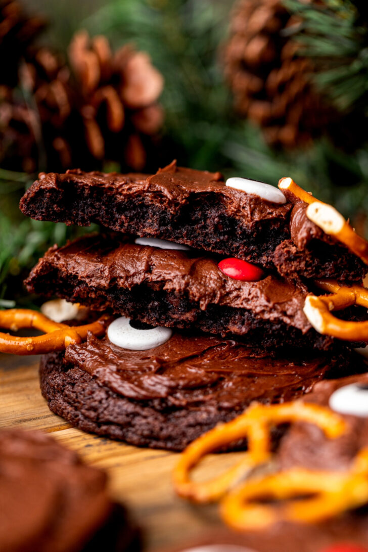 Stack of cookies with one cookie split in half.
