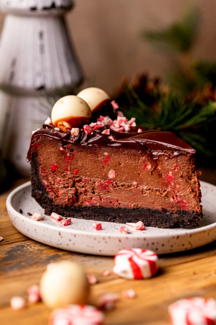 One slice of cheesecake on a plate.