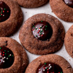 Side view of chocolate thumbprint cookies.