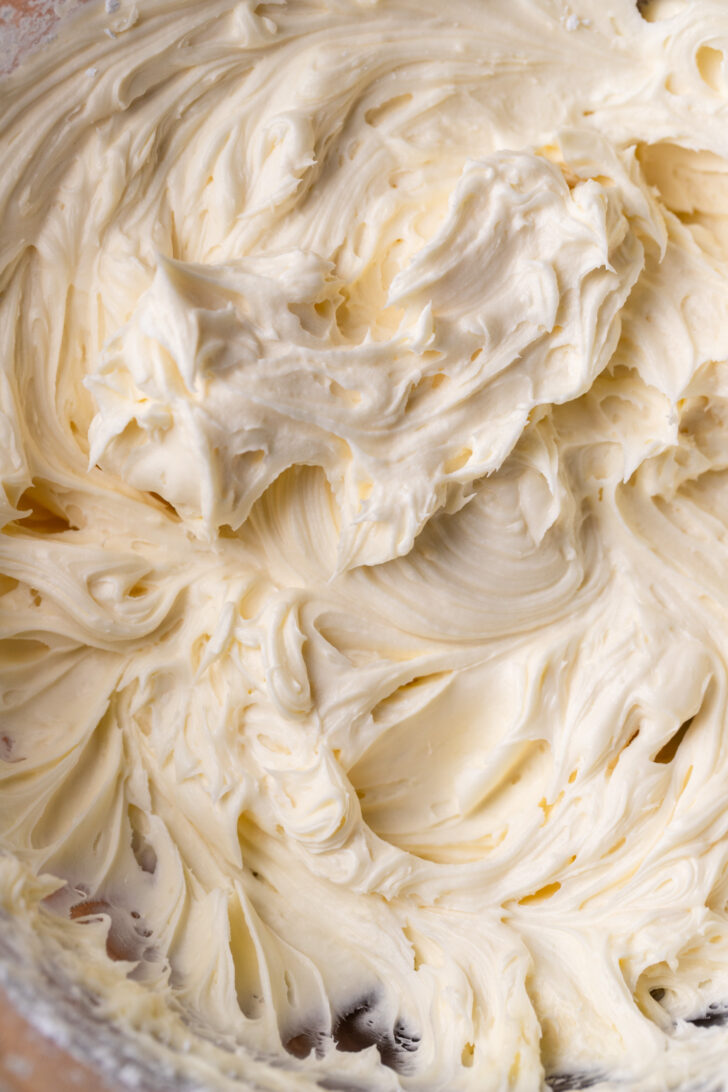 Cream cheese frosting in a bowl.