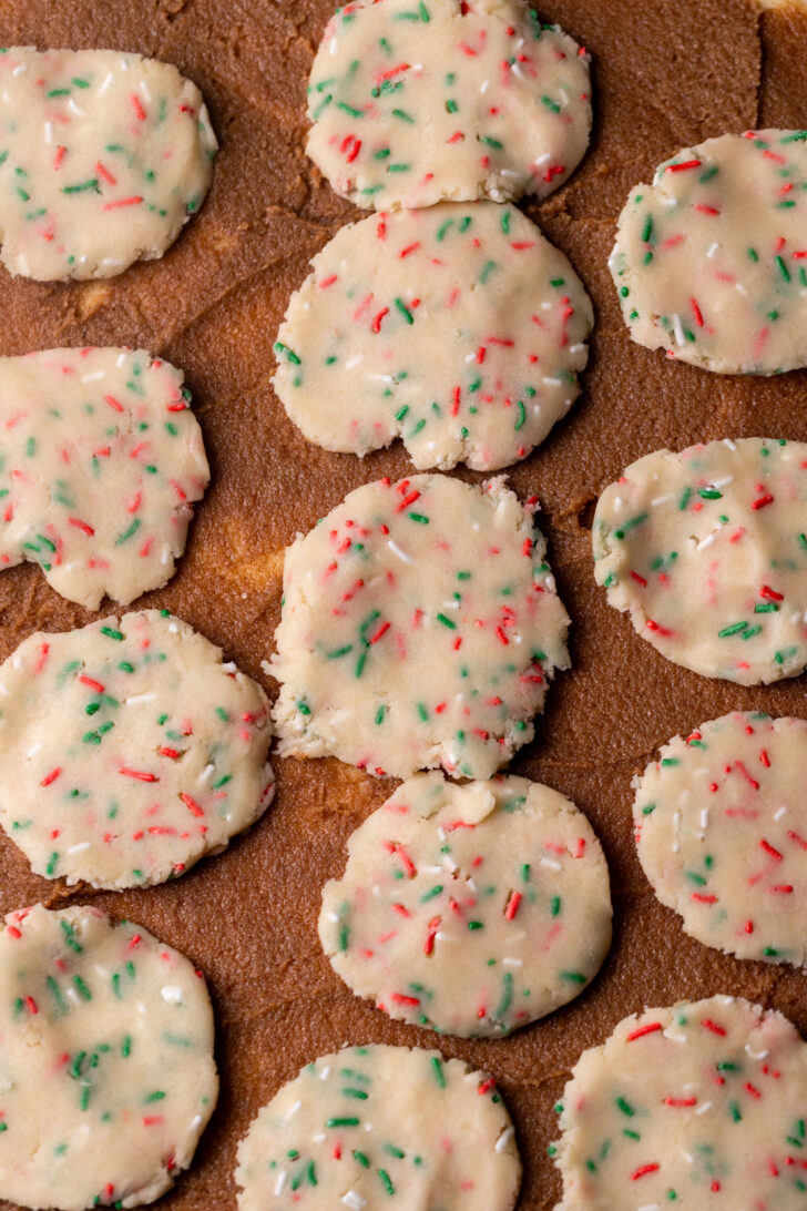 Cookie dough discs on top of cinnamon filling.