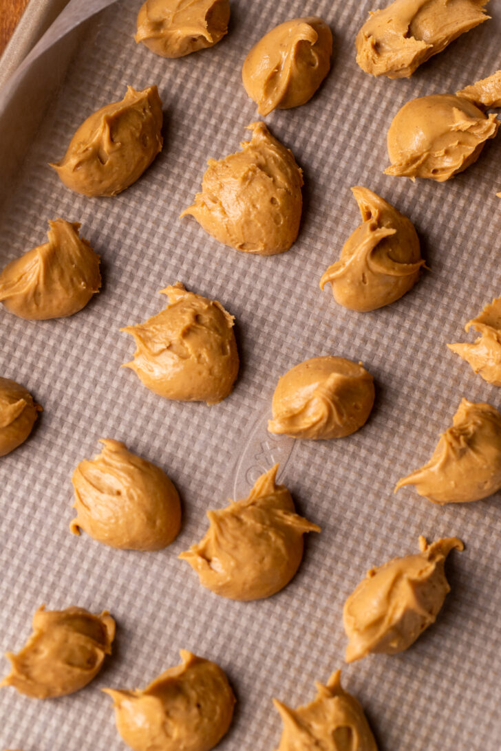 Peanut Butter dollops on a tray.