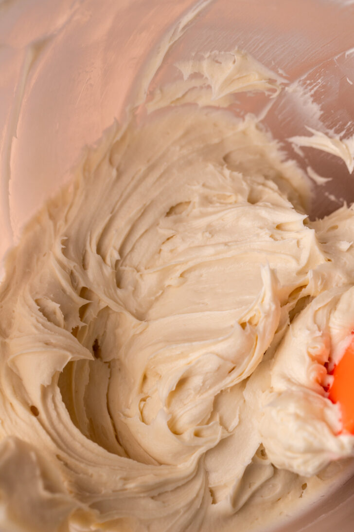 Cream cheese frosting in a bowl.