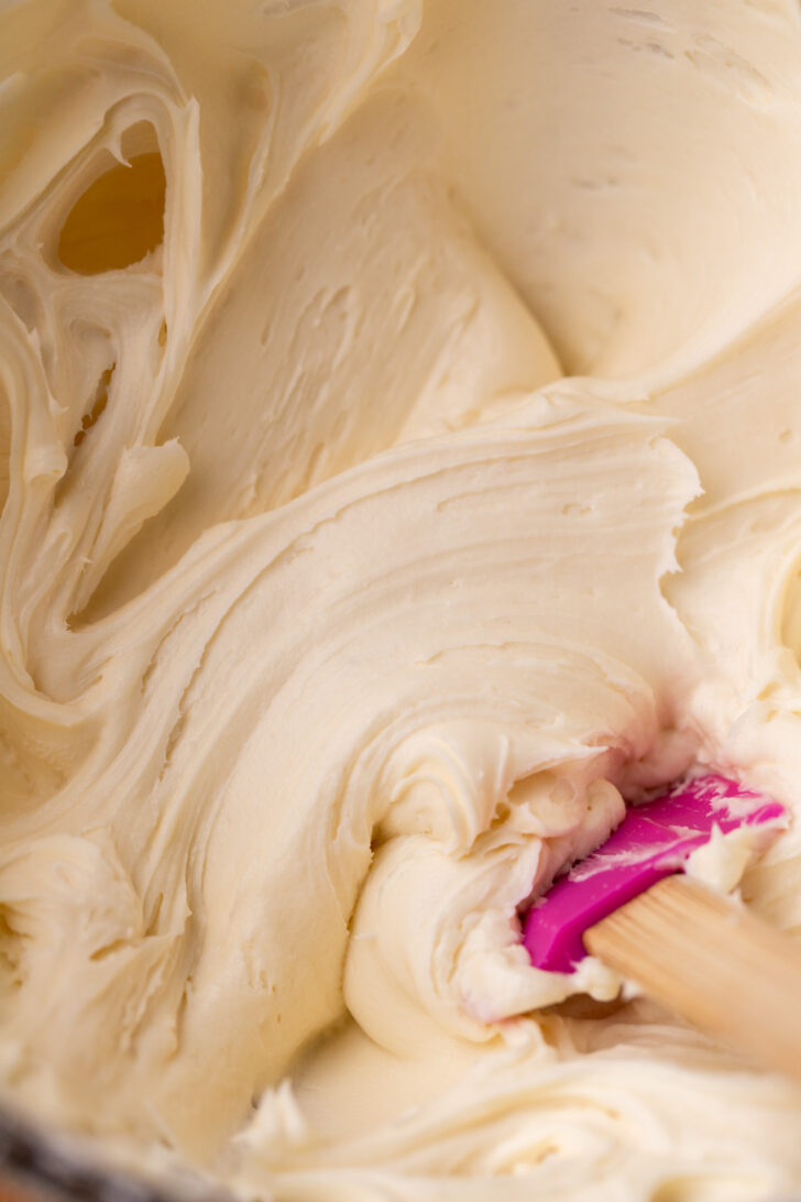 Cream cheese frosting in a bowl.