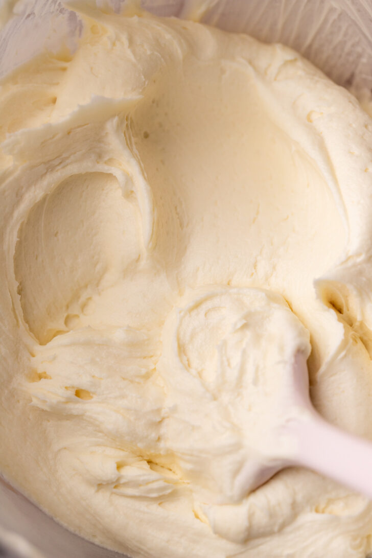 Cream cheese frosting in a bowl.