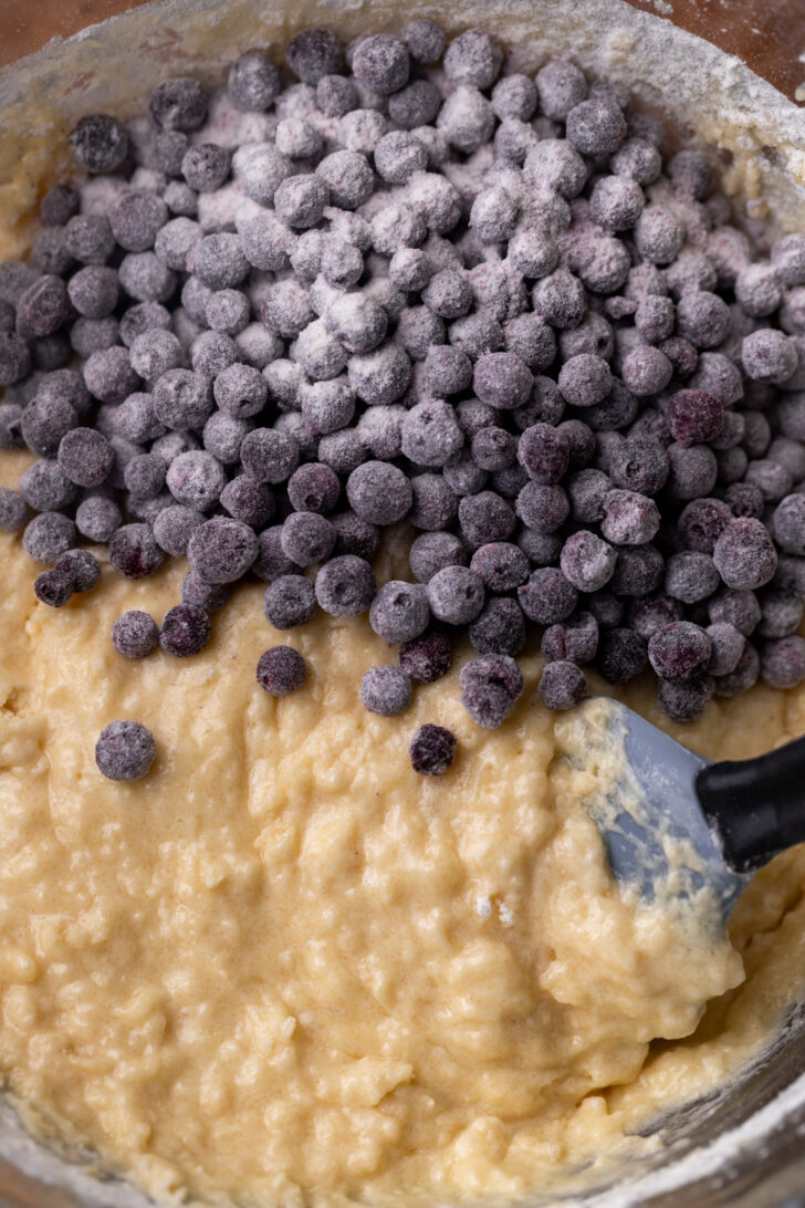 Blueberries on top of the batter.