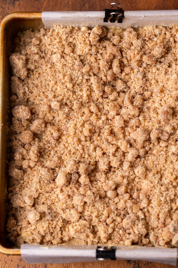 Cinnamon crumble on top of batter.