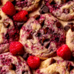 Close up of chocolate chip raspberry cookies on a platter.
