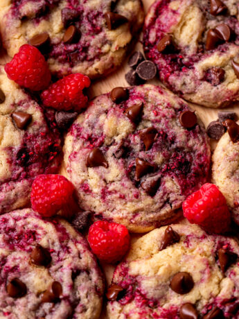 Close up of chocolate chip raspberry cookies on a platter.