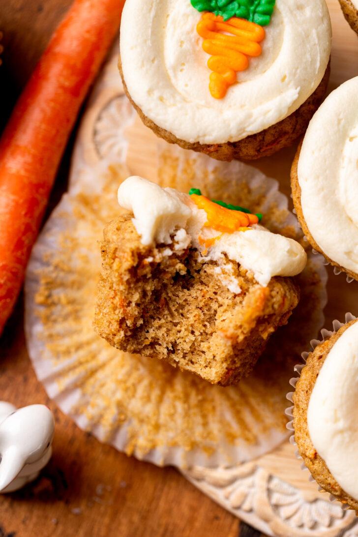 Bite missing from cupcake.
