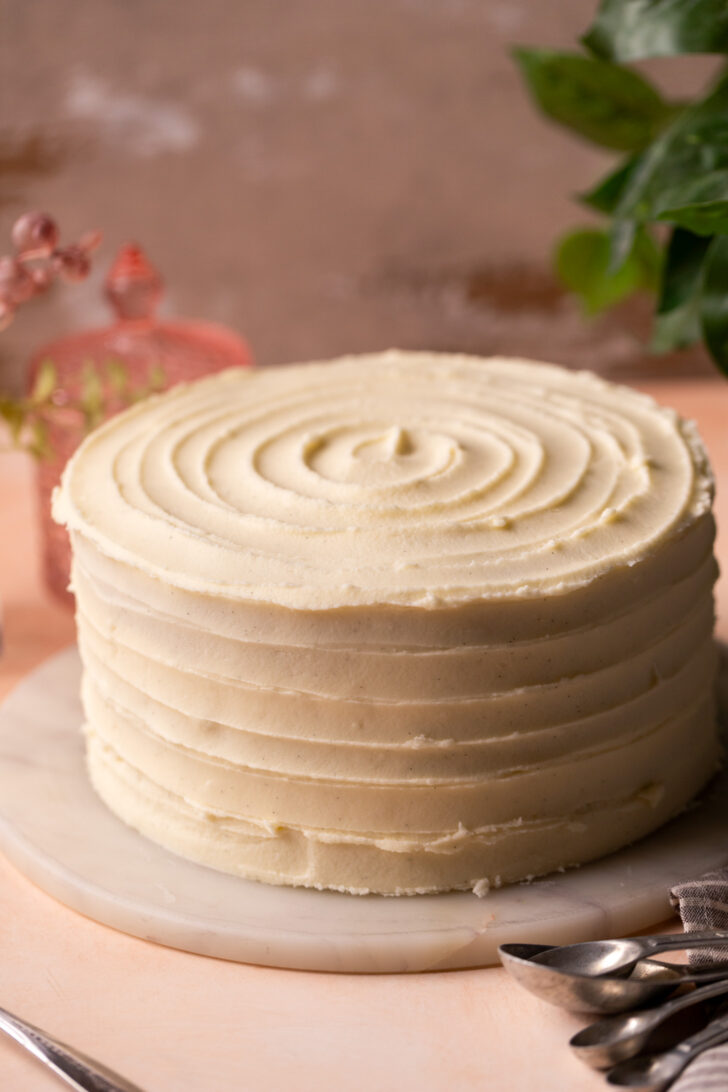 Decorated cake on a marble board.
