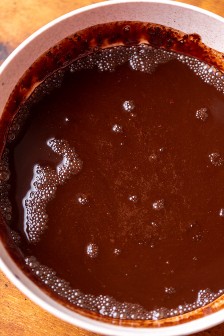 Butter and cocoa powder in a bowl.