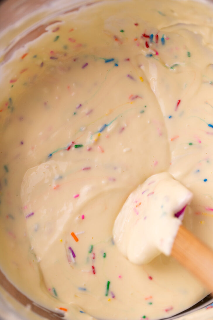 Funfetti cheesecake batter in a bowl.