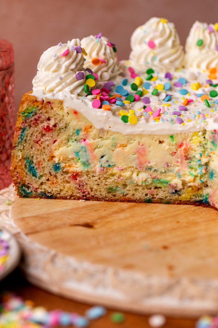 Close up of the side of funfetti cake cheesecake.