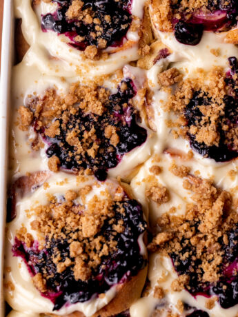 Top view of baked blueberry muffin cinnamon rolls.