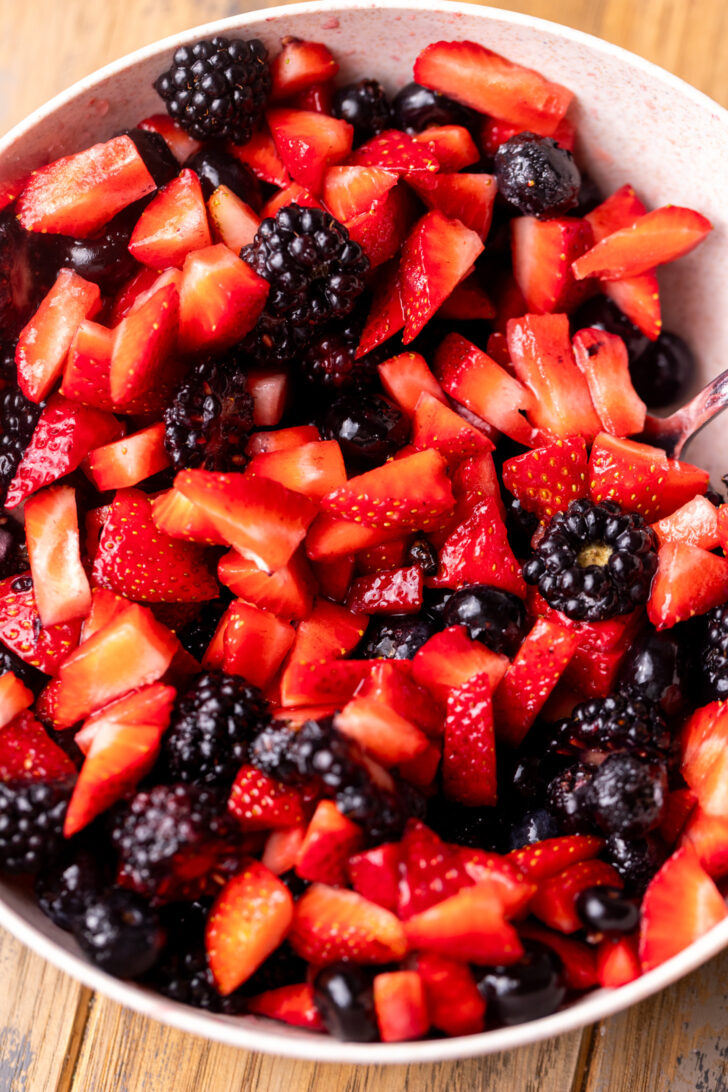 Cut berries in a bowl.