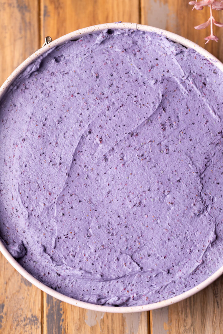 Blueberry mousse on top of cake.