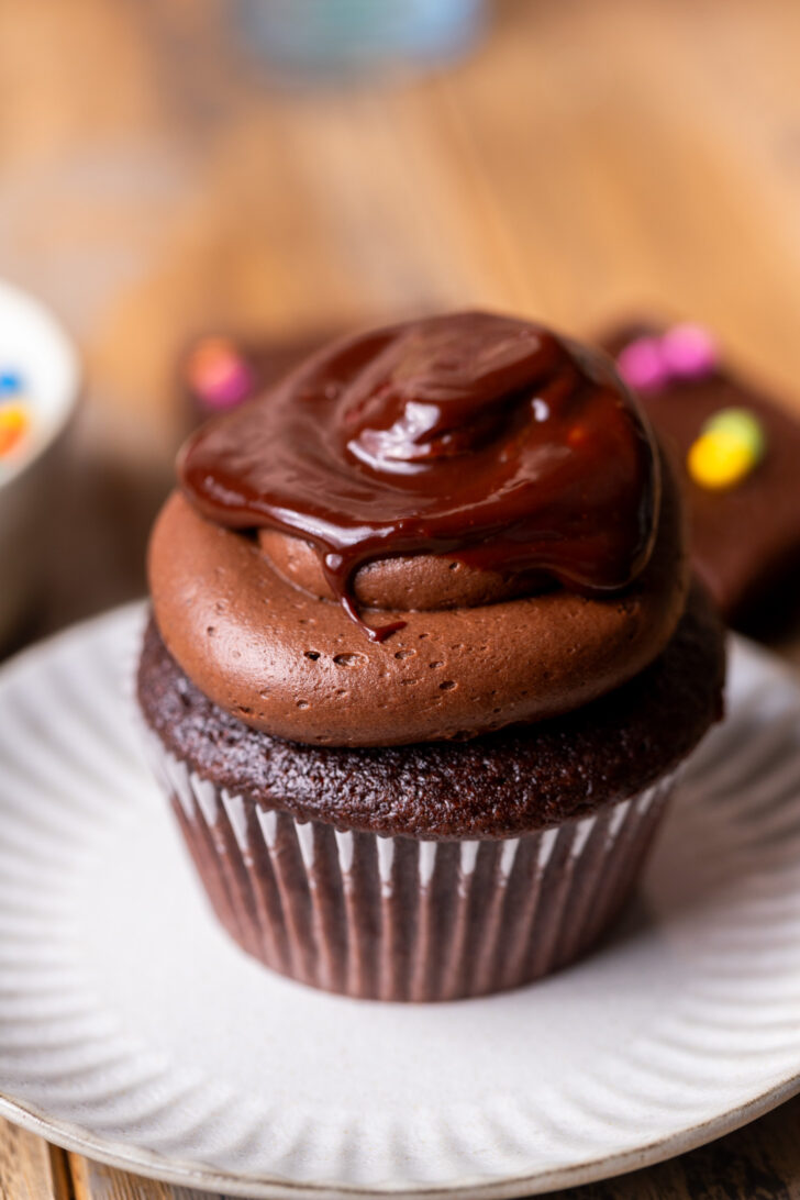 Decorated cupcake on a plate.