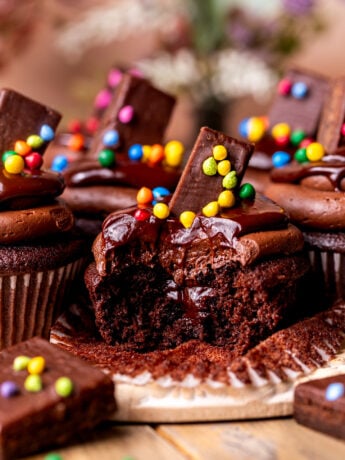 Bite missing from cosmic brownie cupcakes.