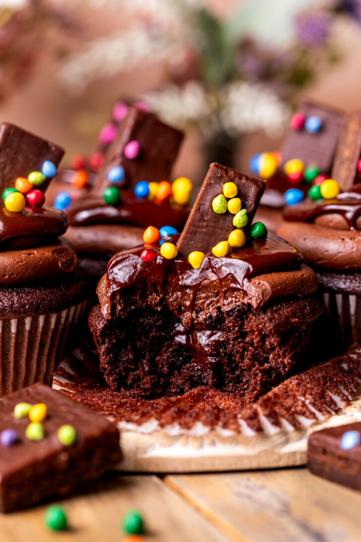 Bite missing from cosmic brownie cupcakes.