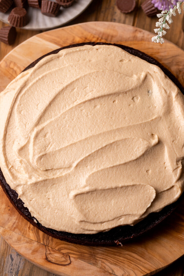 Peanut butter whipped cream on top of cake.